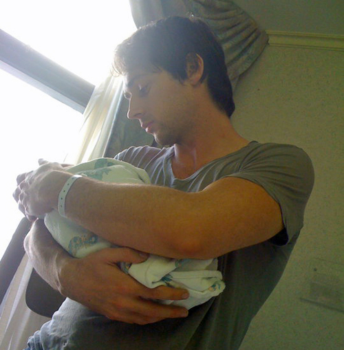 charlie-holding-son-hours